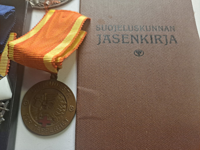 Erä merkkejä ja jäsenkirja
