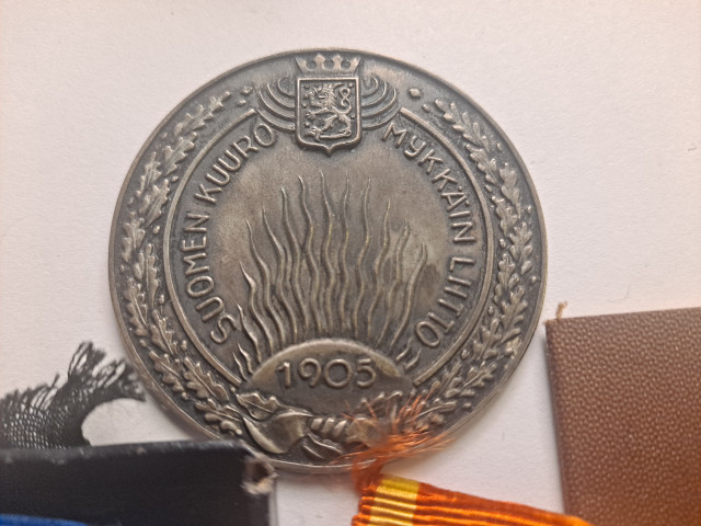 Erä merkkejä ja jäsenkirja