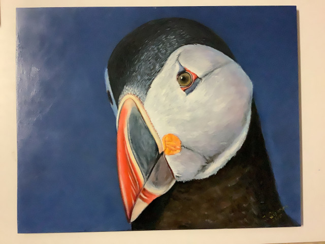 Keraamiselle levylle maalattu lunni