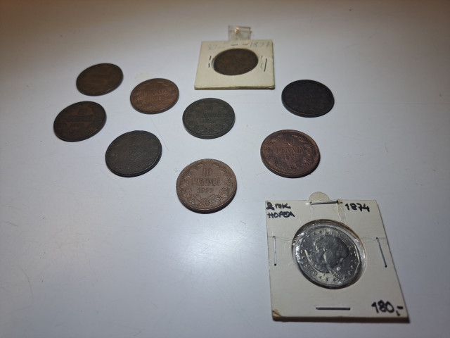 Vanhoja kolkoita, yksi hopeakolikko