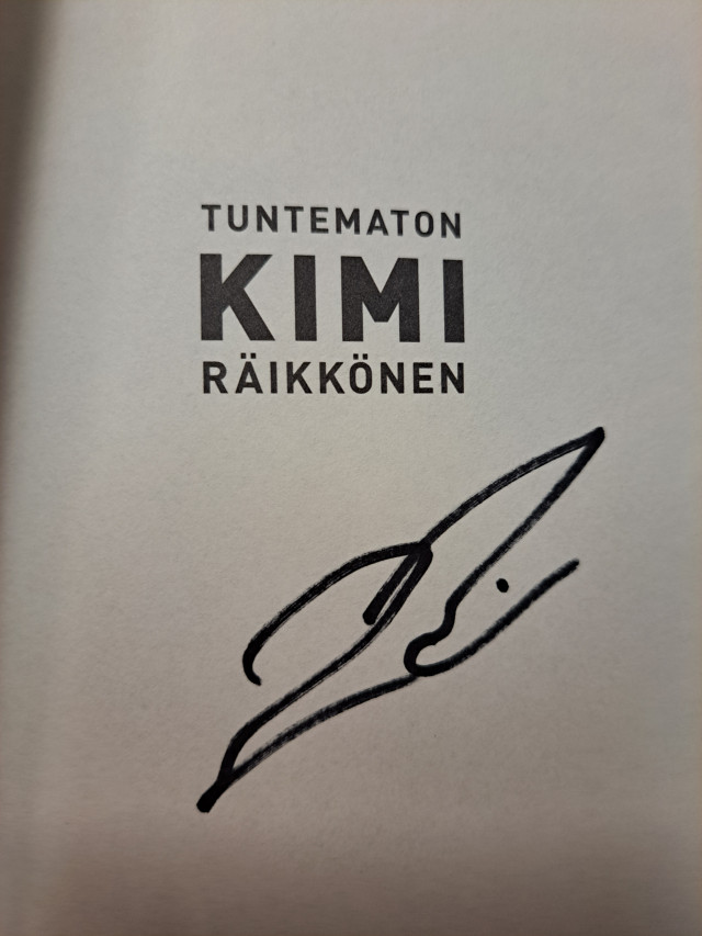 Kimi Räikkönen-kirja signeerauksella