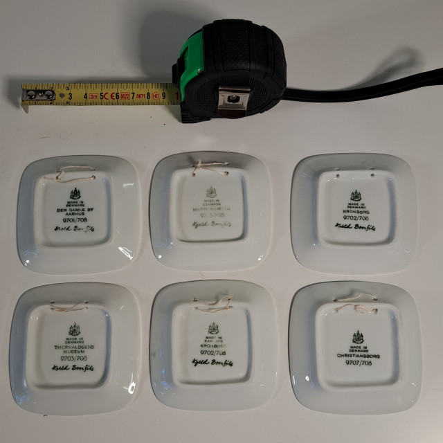 Pienet keraamiset seinätaulut