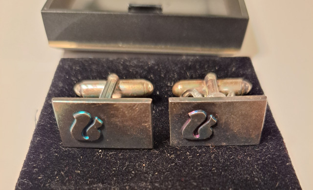 Hopeiset kalvosinnapit