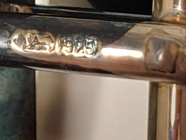 Hopeiset kalvosinnapit