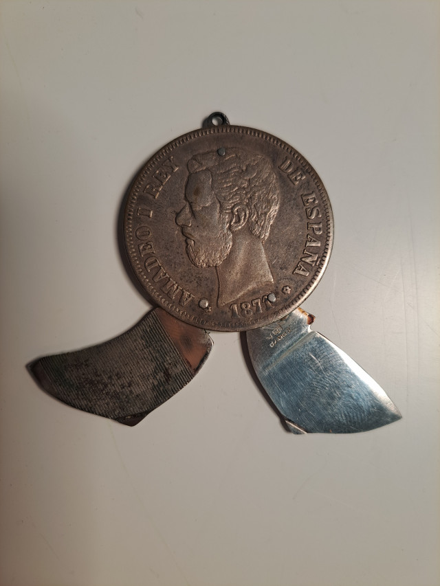 Hopeakolikko linkkuveitsi