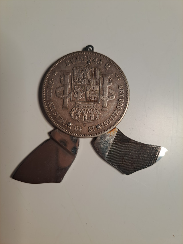 Hopeakolikko linkkuveitsi