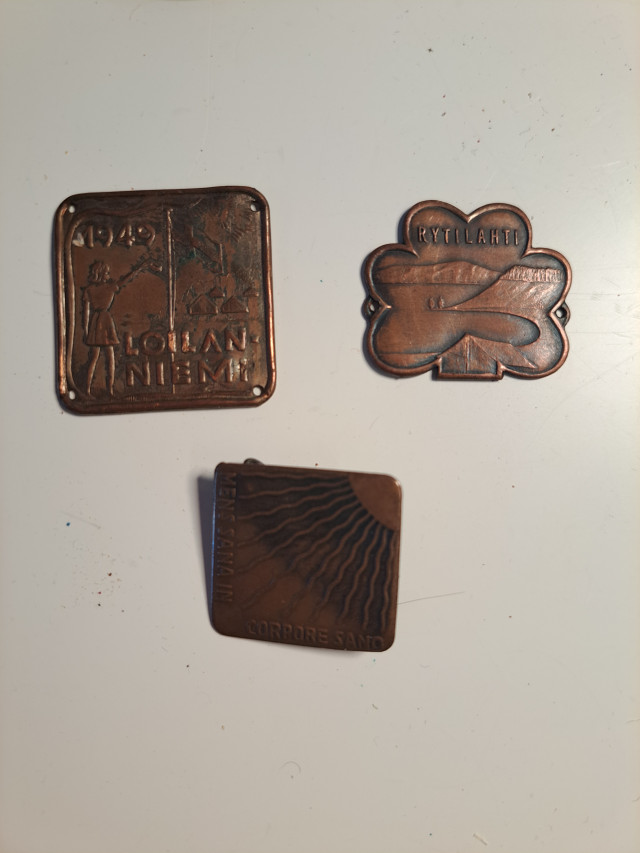 Vanhoja kuparisia merkkejä