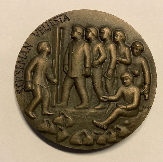 Seitsemän veljestä 100-vuotismitali