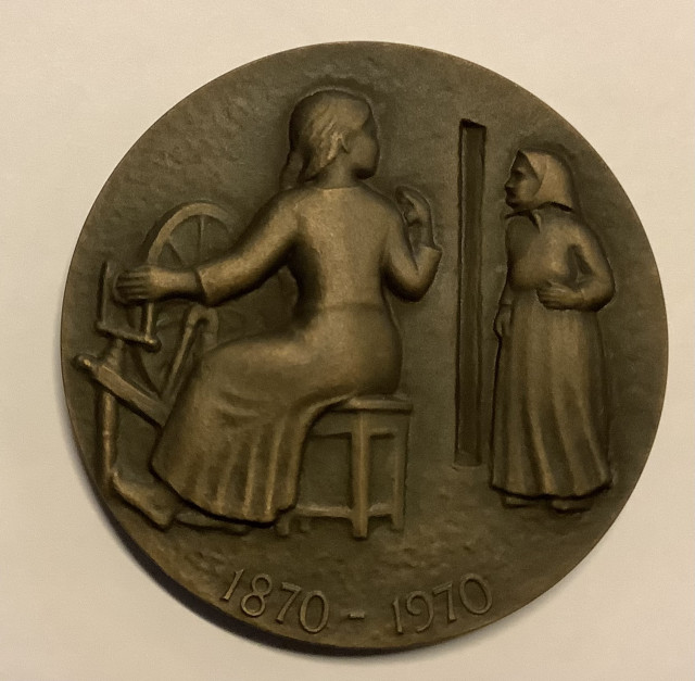 Seitsemän veljestä 100-vuotismitali