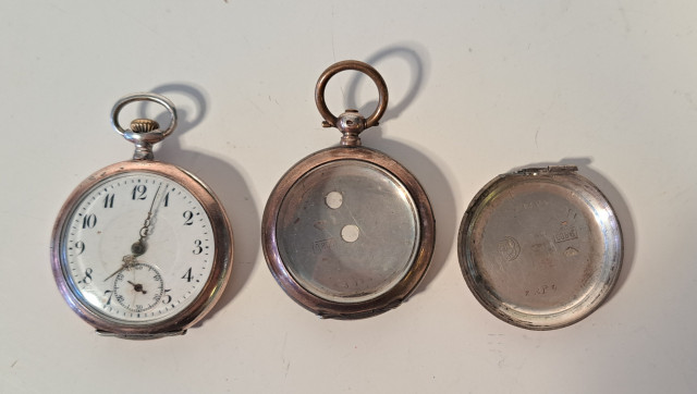 Taskukello ja kuoret hopeaa