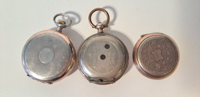 Taskukello ja kuoret hopeaa