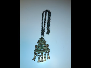 Vanha Kalevalakoru Karkun riipus