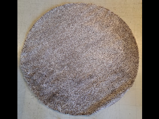 Ruskeasävyinen pyöreä matto halkaisija 2m